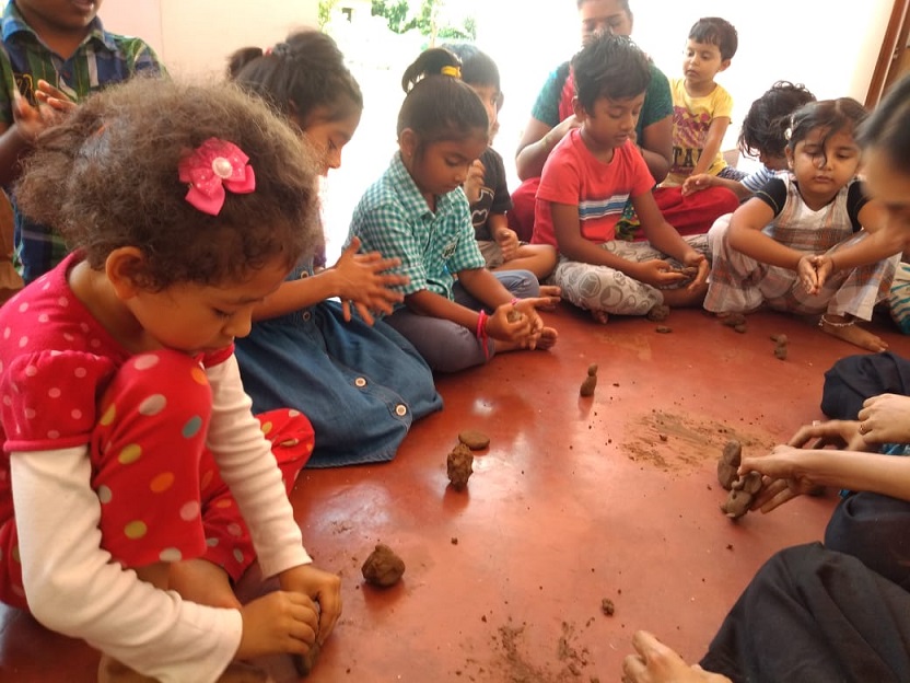 Good News from ATA 2 319 Using clay to make Ganesha